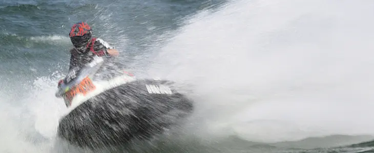 person riding a jet ski